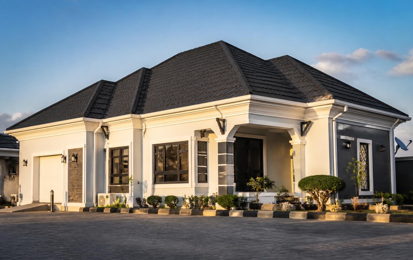 Modern Nigerian home finished with a dark stone coated roof